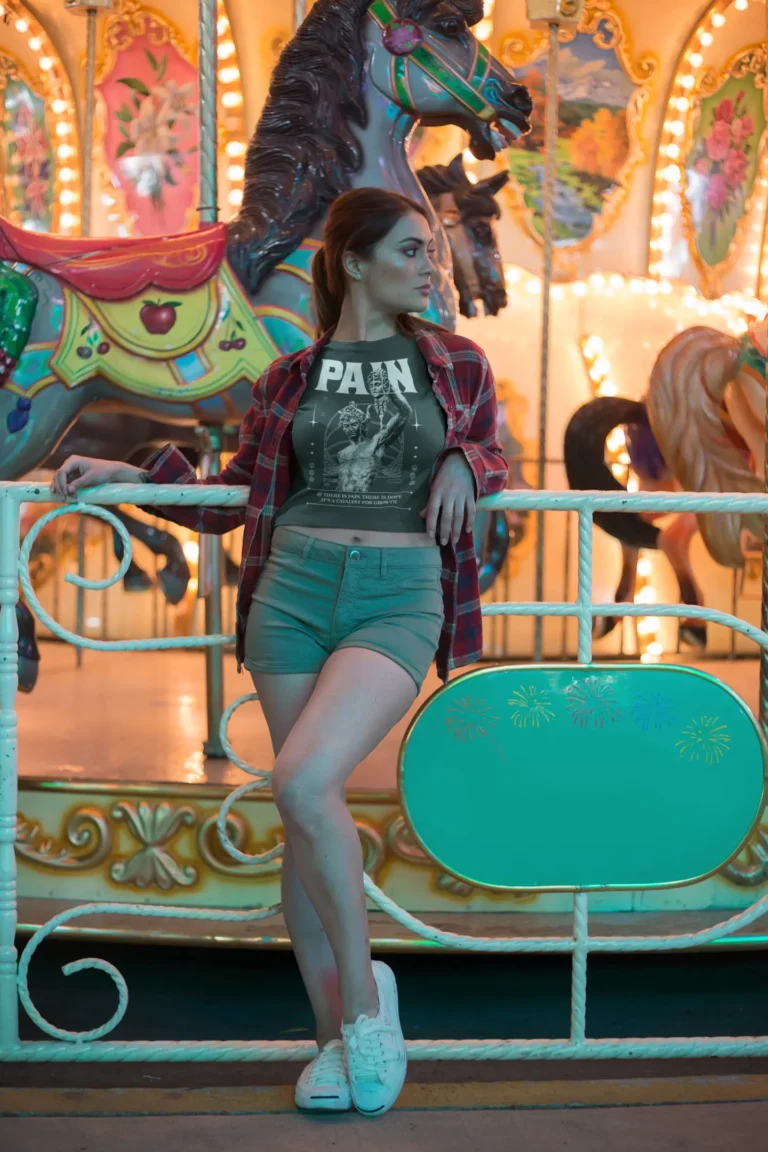 pretty-woman-wearing-a-crop-top-t-shirt-mockup-against-a-carousel-a19447